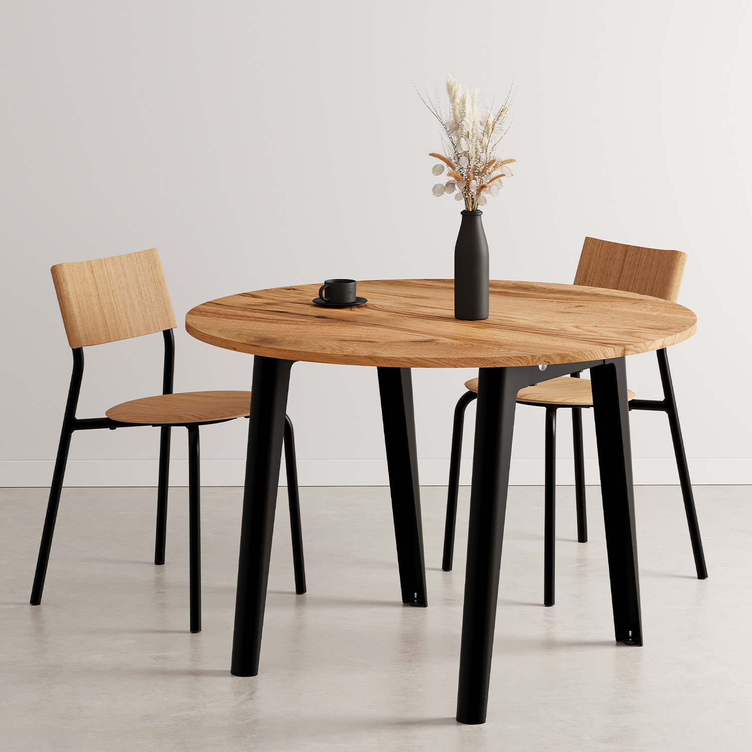 Modern round pedestal deals table